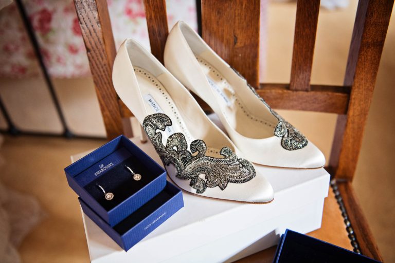 Wedding shoes and jewellery by Cardiff wedding photographer, Blooming Photography