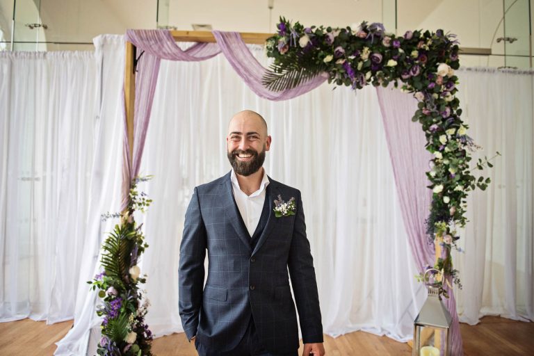 Groom waiting for his bride at Margam Country Park.
