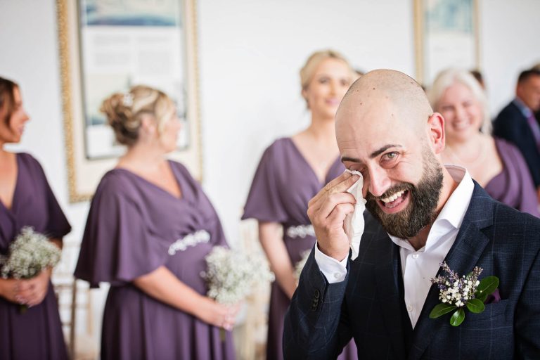 Groom crying natural photos at Margam Country Park.
