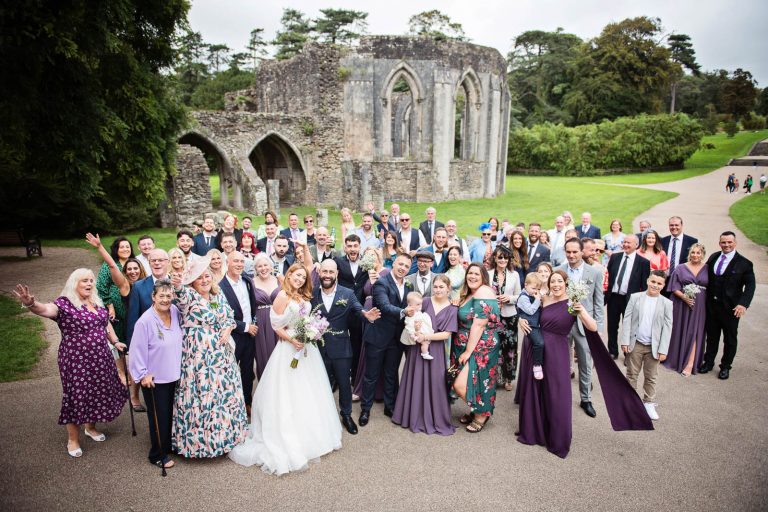 Wedding group photo of all the guests at Margam Country Park..