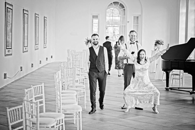 Natural image taken of the guests having fun during the wedding breakfast at Margam Country Park.