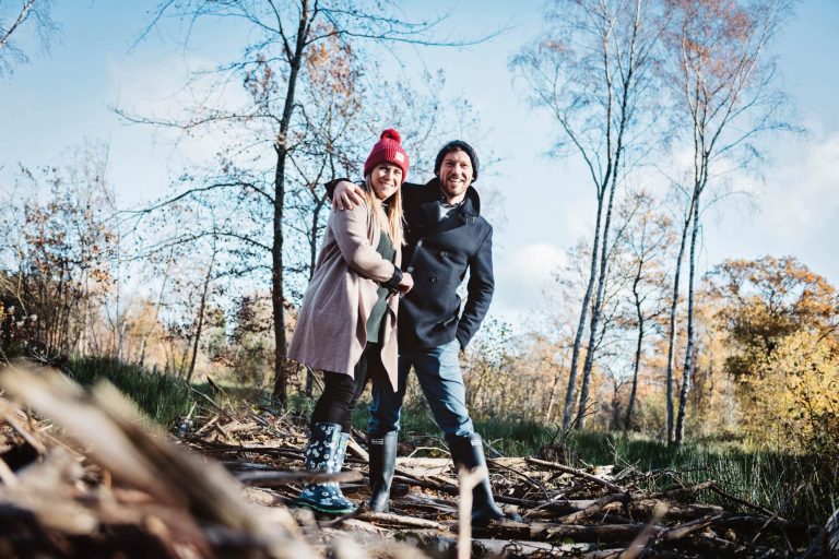 Relaxed photo of couple taken at Westonbirt Arboretum for their engagement shoot.