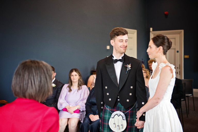 Natural Documentary wedding photography at Winchester registry office. Photo by Blooming Photography