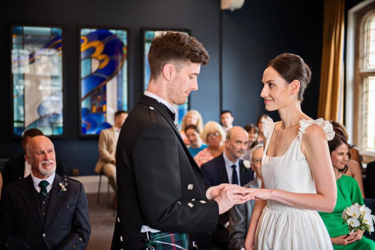 Natural wedding photos at Winchester registry office. Photo by Blooming Photography