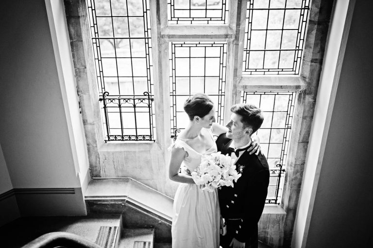 Unposed wedding photography at Winchester Registry office. Photo by Blooming Photography