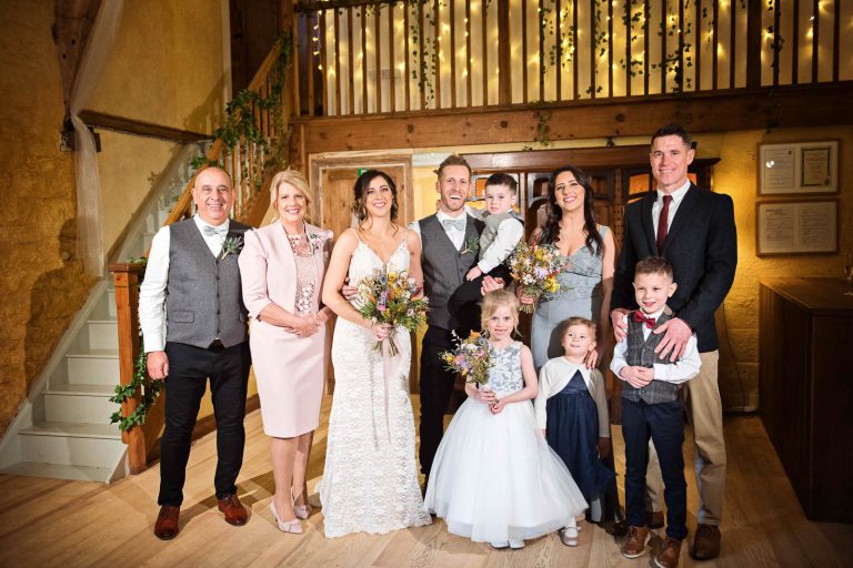Family photo inside during a rain shower.
