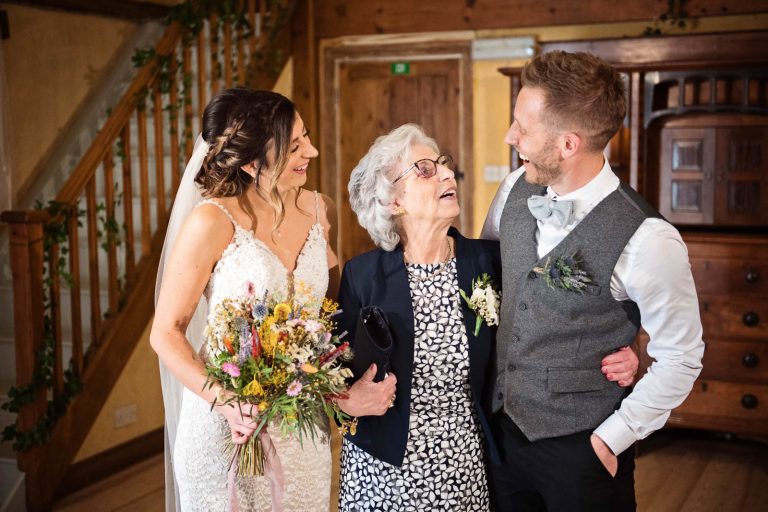 Family photo inside during a rain shower.
