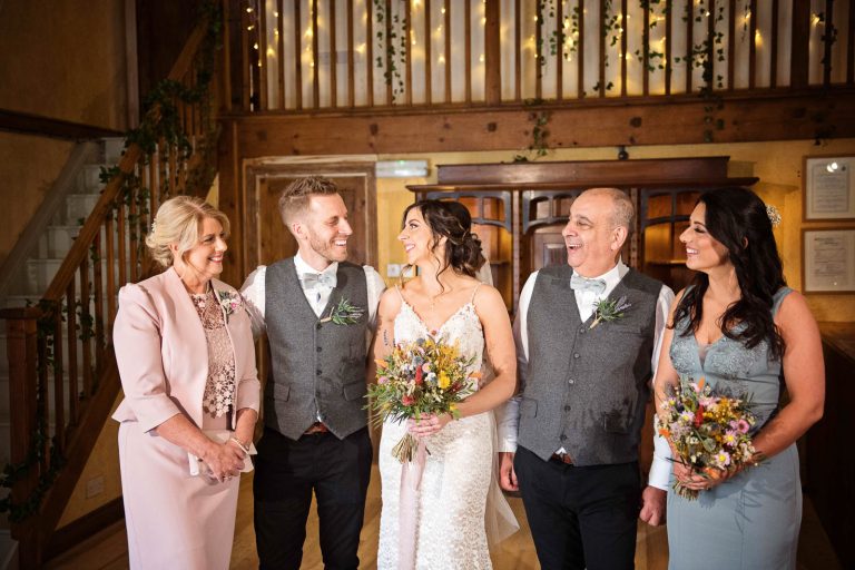 Family photo inside during a rain shower.