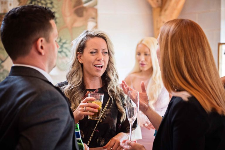 Candid photo of wedding guests.