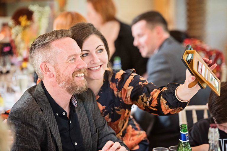 Candid photo of wedding guests.