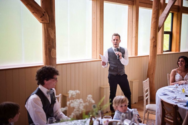 The groom delivering his speech at Owlpen Manor.