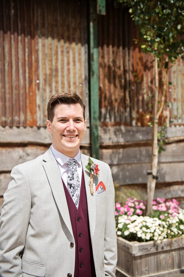 Relaxed photo of the groomsman.
