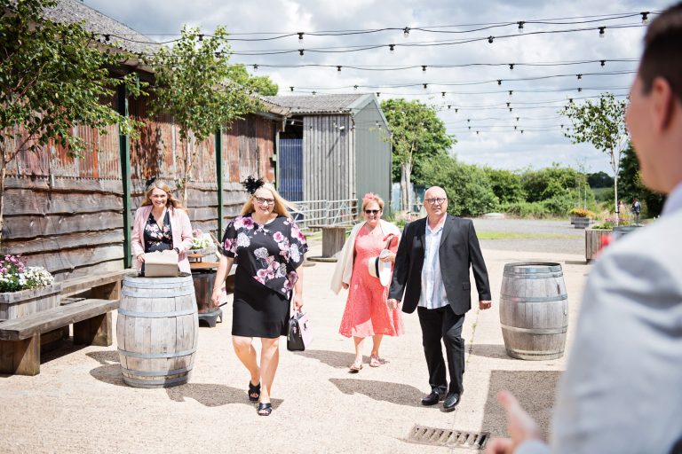 Storytelling photography of late arrivals of wedding guests.
