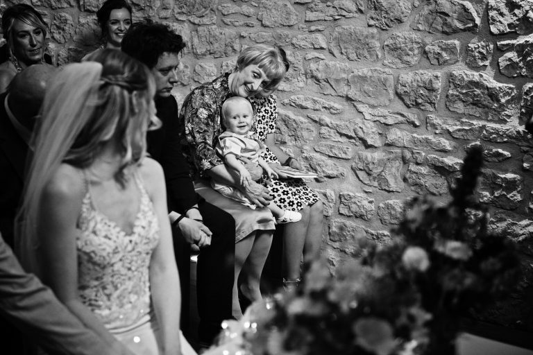 B&W candid photo of baby.