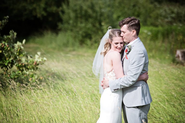 Bride and groom have a moment together.