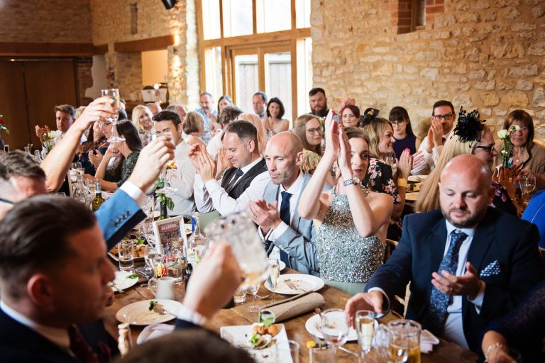 Guests cheer at speeches at Huntsmill Farm.