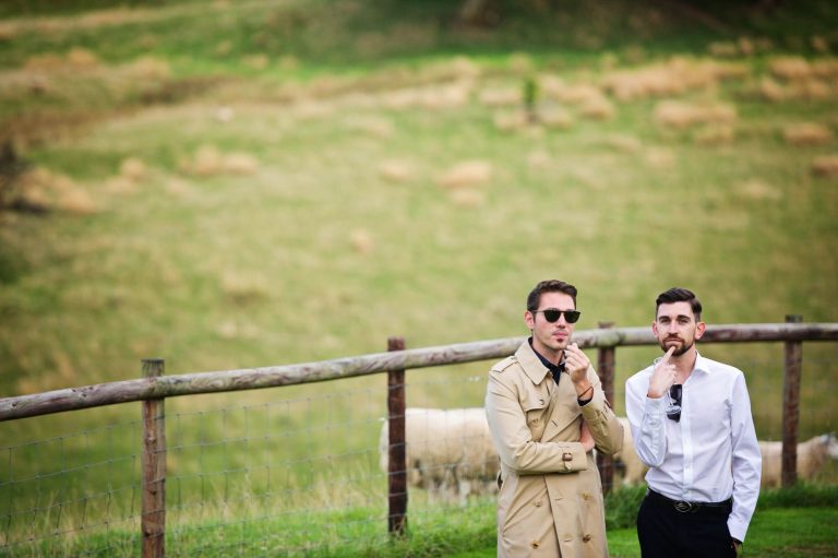 Countryside wedding guests candidly captured at Kingscote Barn