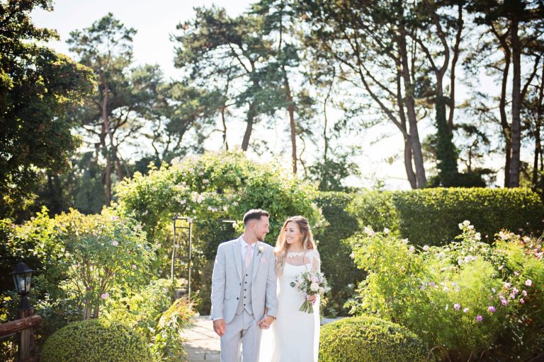 Joyful couple portrait at Kingscote Barn