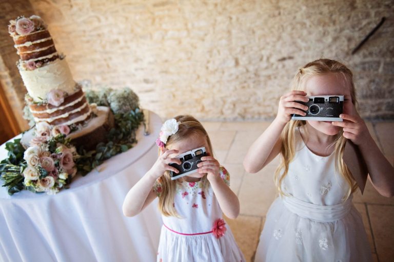 Candid wedding photo Kingscote Barn