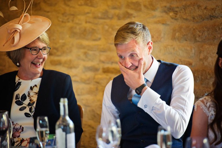 Fun moments candidly captured at Kingscote Barn