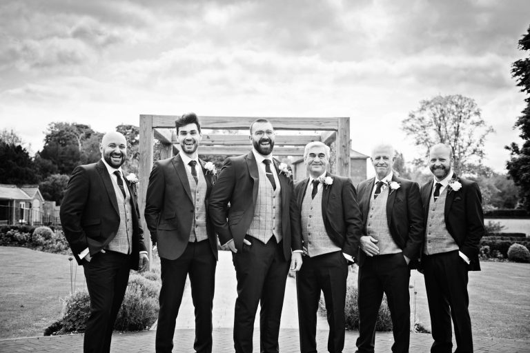 B&W photo of the groomsmen.