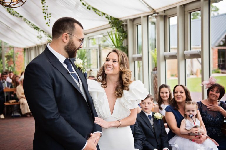 Bride and groom meet each other for the first time during their wedding ceremony at Syrencot.
