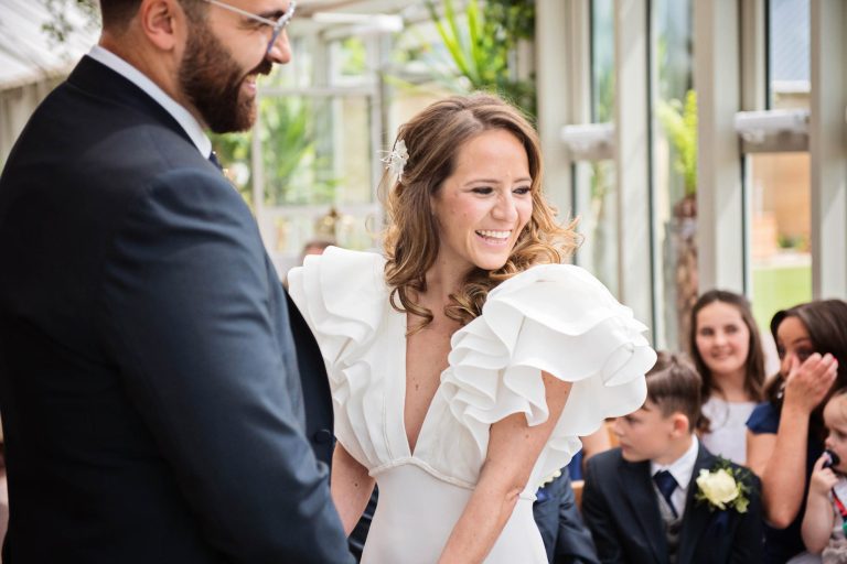 Candid photo of bride during the speeches.