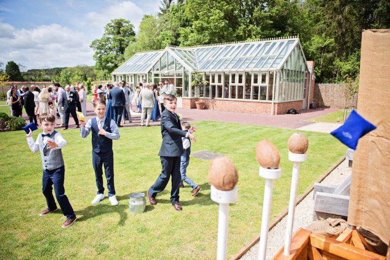 Candid photo of kids playing on the coconut sty at Syrencot.