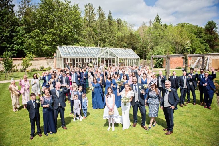 Large group shot of wedding party at Syrencot.