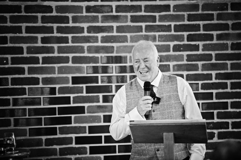 Father of bride delivering his wedding speech at Syrencot. B&W photo.