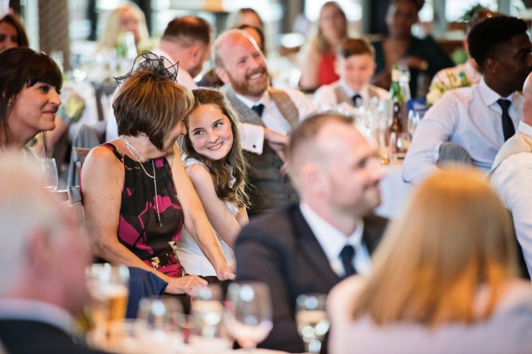 Candid photo of wedding guests.