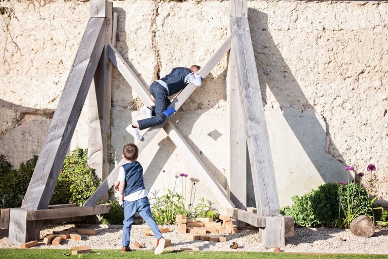 Candid photo of kids climbing.