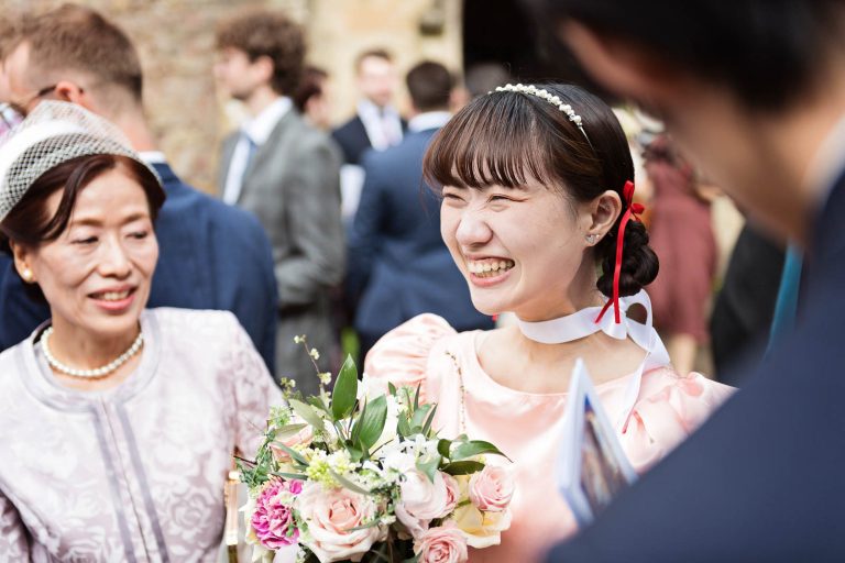 Candid photograph by Blooming Photography.