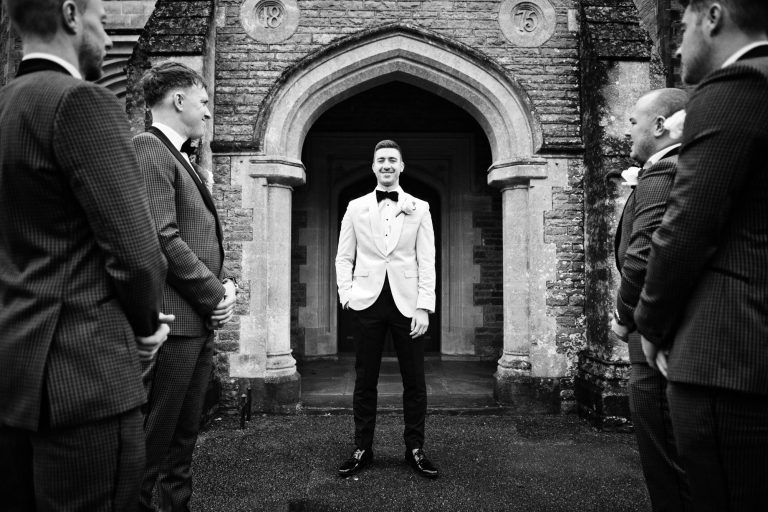 B&W photo of groom and his merry men at Tortworth Court.