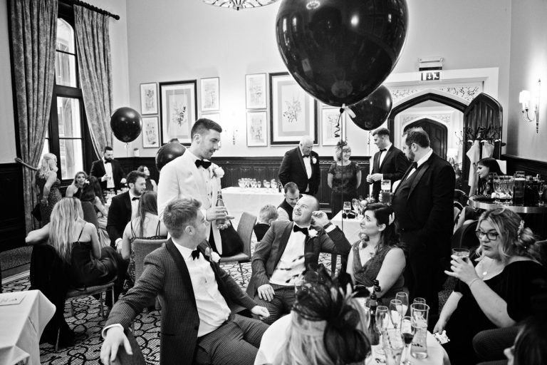 Wedding reception in full swing at Tortworth Court. B&W photo.