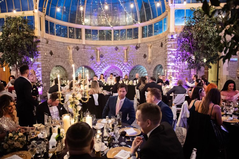 Wedding breakfast in full swing at the Tortworth Court Hotel during a winter wedding.