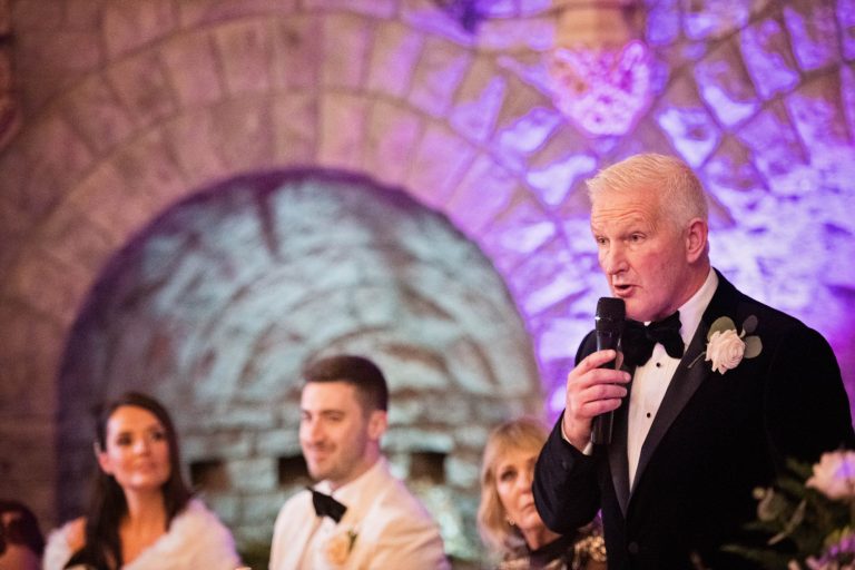 Grooms dad delivering his wedding speech.