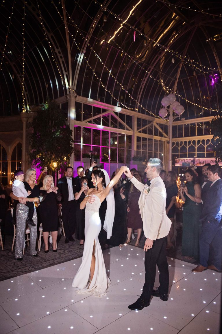 Bride and groom during their first dance in the Orangery at Tortworth Court.