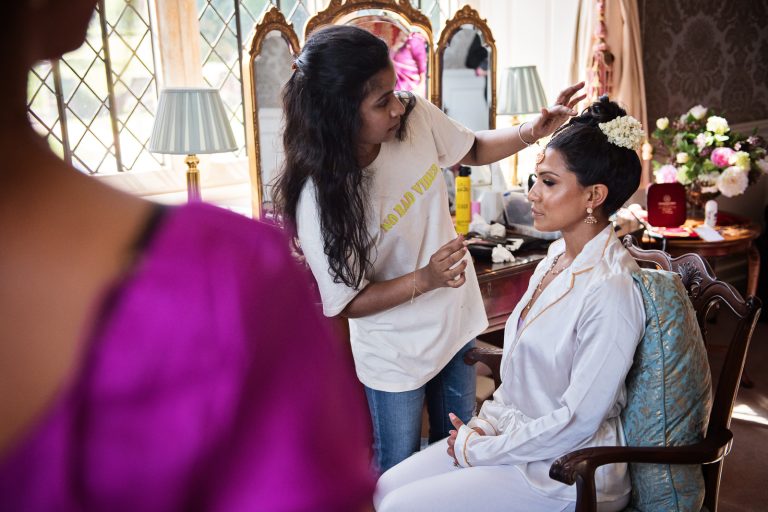 Bride's maang tikka at North Mymms Park, candidly photographed by Blooming Photography