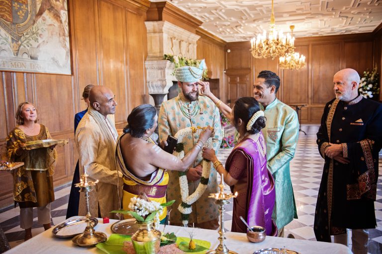 Groom after Baarat at North Mymms Park, candidly photographed by Blooming Photography.