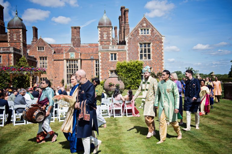 Grooms arrival at North Mymms Park, candidly photographed by Blooming Photography.