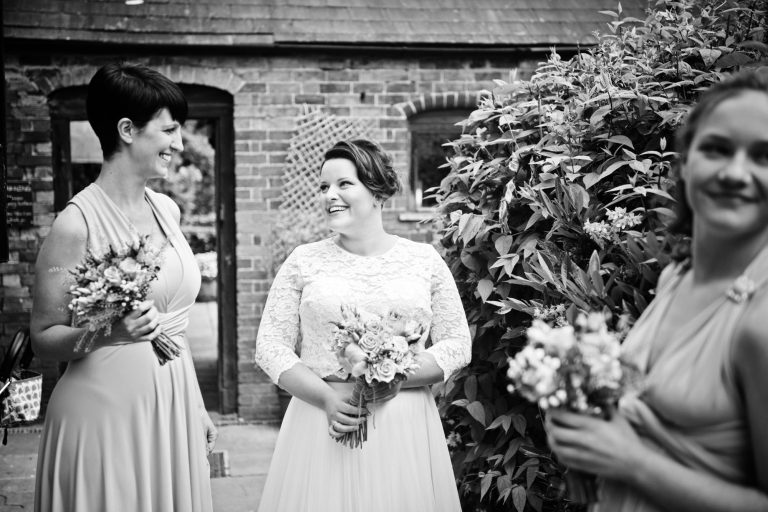 B&W documentary photo of bride.