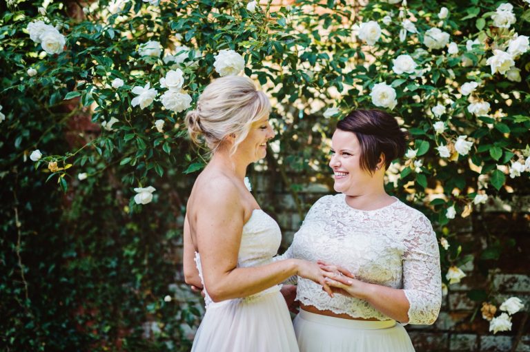 Bride and bride have a moment together.