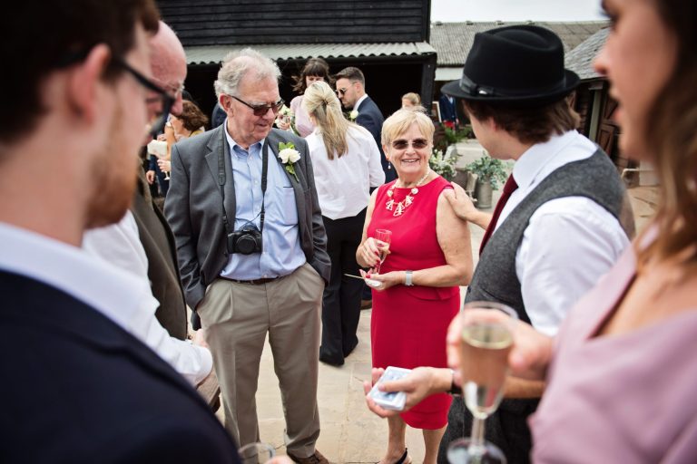 Candid wedding photo at Gloucestershire wedding venue Over Barn, Gloucester.