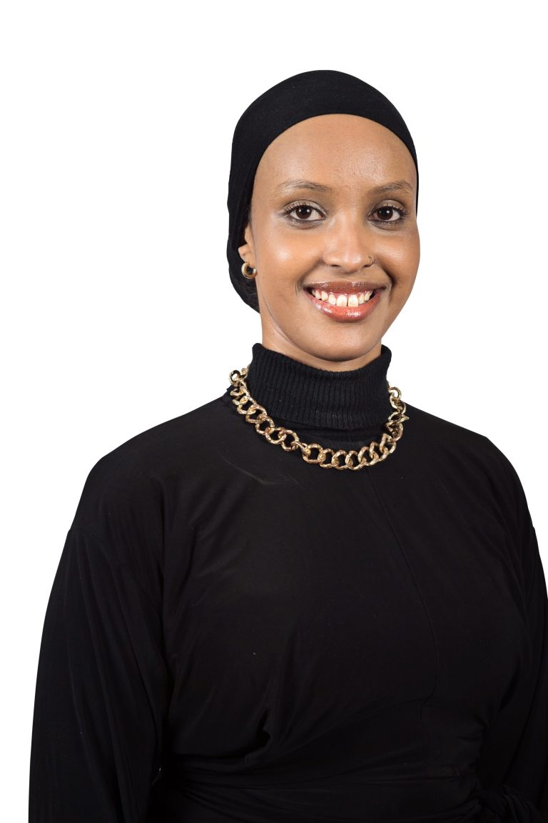 Company Headshot Of A Staff Member Using A Plain White Background.