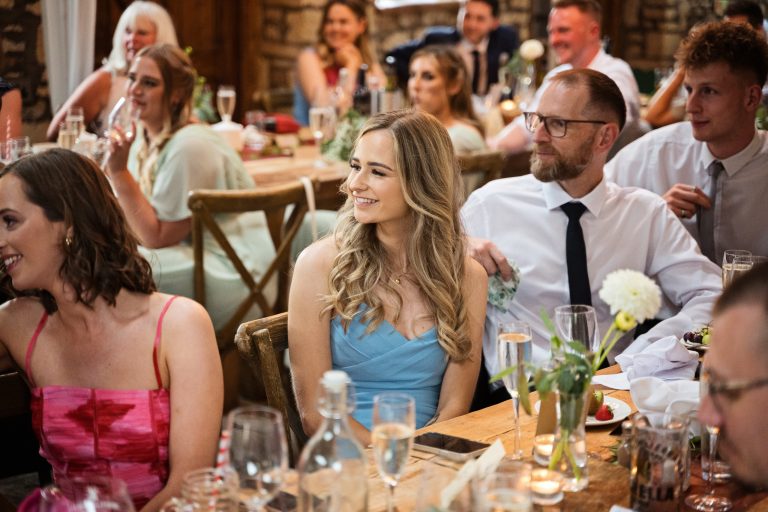 Guests enjoying listening to the wedding speech