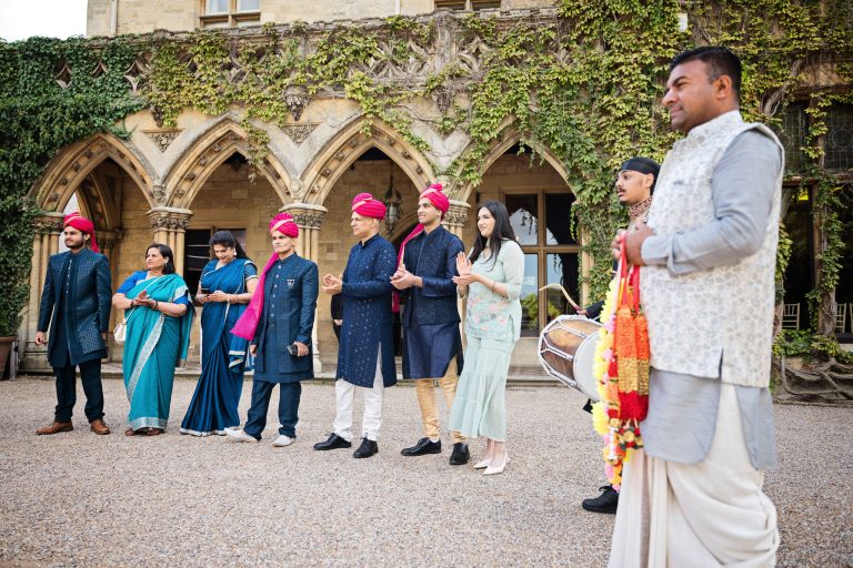 Baraat, Manor By The Lake candid photo by Blooming Photography