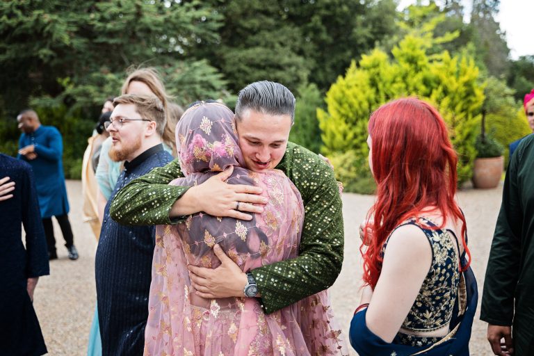 candid moments taken at Manor By The Lake by Blooming Photography