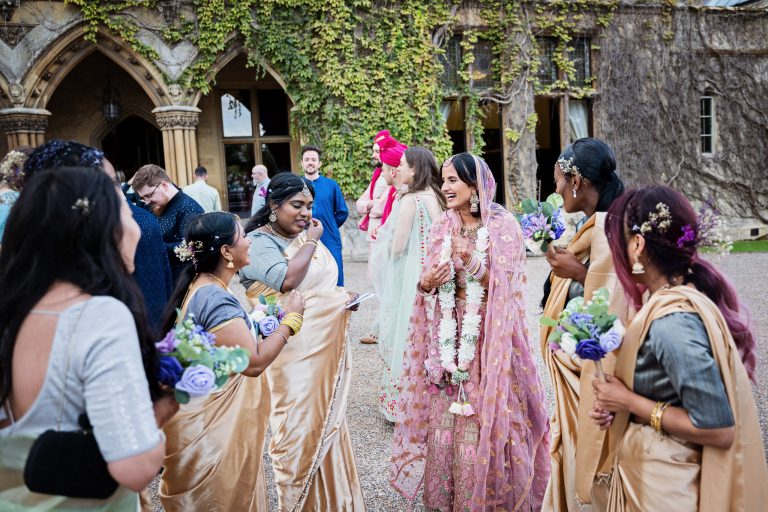 candid moments at Manor By The Lake by Gloucestershire wedding photographer, Blooming Photography