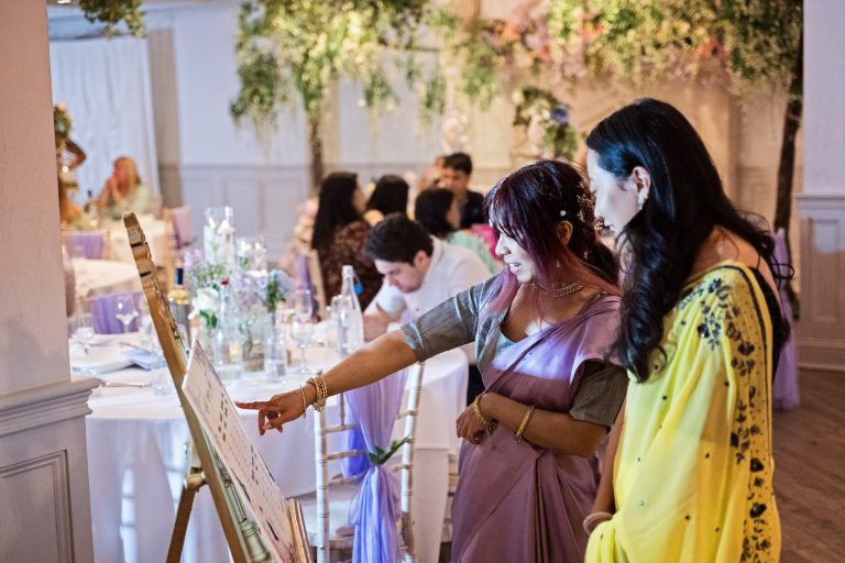 Candid wedding image at Manor By The Lake by Cheltenham Wedding Photographer Ben Roberts, Blooming Photography